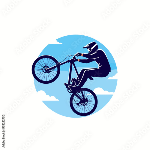 Extreme mountain biker silhouette performing high jump stunt