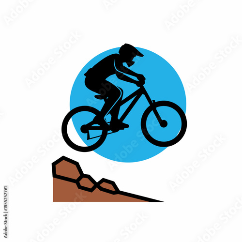 Minimalist silhouette of mountain biker jumping over rocky hill