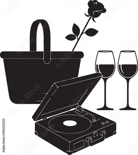 A charming outdoor picnic scene featuring a basket, a rose, two wine glasses, and a vintage record player for a romantic and leisurely experience.
