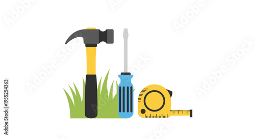 Hammer, screwdriver, and measuring tape on green grass