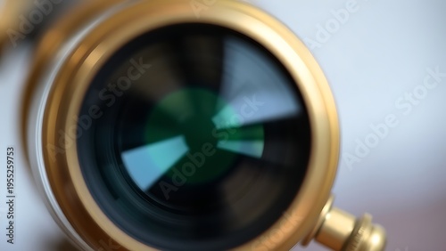 receding. Close-up of an antique telescope's eyepiece with brass and glass details. STEM education sheets, lab safety posters, designed for STEM education and laboratory safety posters.