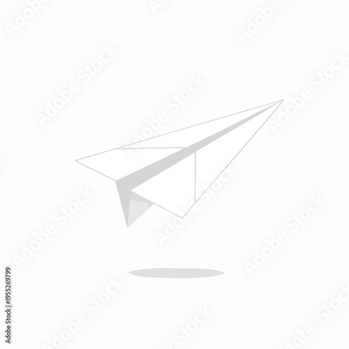 Minimalist grey paper airplane in mid-flight with a soft shadow