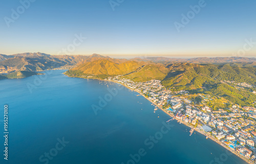 Wallpaper Mural Marmaris, Turkey. Panoramic aerial view of city, forested mountains and bay at morning. Urban and natural landscape in morning light. Aerial view. Torontodigital.ca