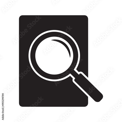 A black icon of a magnifying glass on a rectangular object