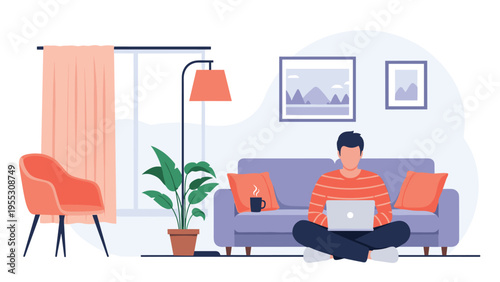 Young man in a striped shirt sitting cross-legged on the floor of a cozy living room while working on his laptop with a cup of coffee.