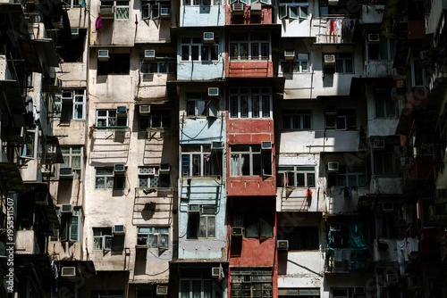 Monster Building (Yick Cheong Building) inner courtyard with dense apartments, balconies and hanging laundry in Hong Kong