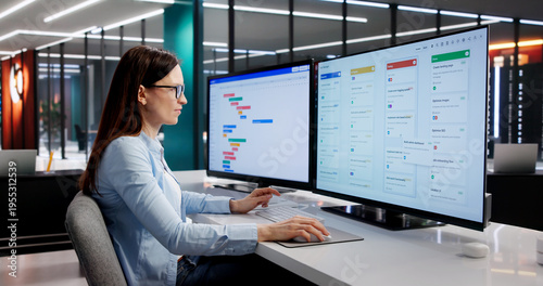 Fotografie Project Manager Analyzes Comprehensive Multi-Screen Schedule With Focus
