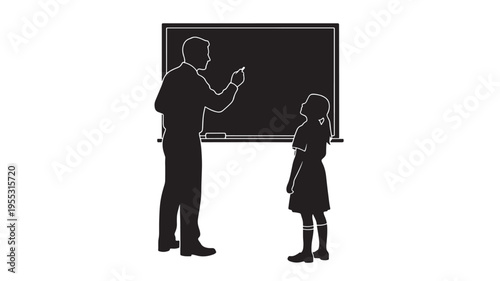 Teacher writing on a blackboard with chalk while a student stands and listens intently in a classroom setting.