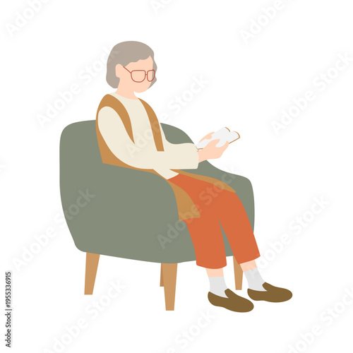 椅子に座って本を読むシニア女性 高齢者の読書シーン