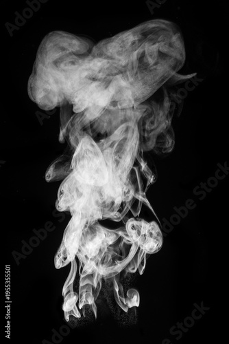 White hot curly steam smoke isolated on black background. Abstract background, design element, for overlay on pictures. Create mystical photos
