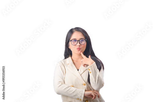 Young woman thinking in cream blazer