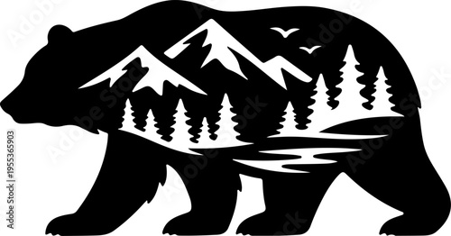 A black bear walks through a forest landscape with mountains and trees.