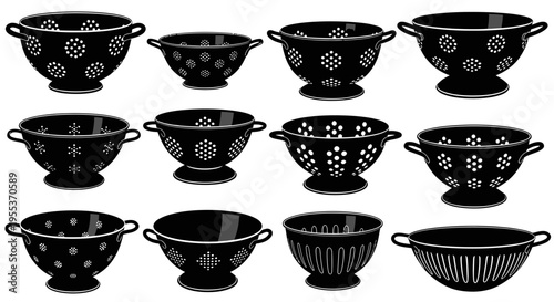 Collection of black metal colanders with various hole patterns on white background for kitchen use