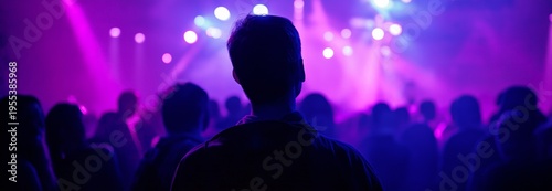 An image of a person enjoying a lively techno music festival
