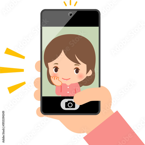 かわいいポーズと表情を作ってセルフィーを撮る女性