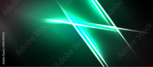 Abstract green lines intersect dark background. Bright glow emanates from central point, creating dynamic visual effect.