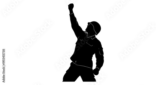 A man in silhouette raises his fist in a powerful gesture of defiance or solidarity.