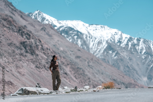 Woman mountain snow outdoor...