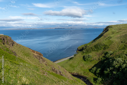 The Isle of Skye,  is a large and scenic island in the Inner Hebrides of Scotland. It's known for its dramatic landscapes.Ocean views from the Lealt Falls lookout