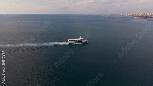 Passenger Ferry Sailing on Open Sea – Aerial Drone View