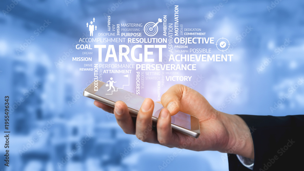 Obraz premium A close-up of a hand holding a smartphone displaying a collage of motivational words related to success, inspiration, and achievement in a business context. Tessel