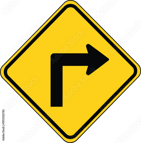 A yellow road sign featuring a black arrow symbol provides a caution warning for a sharp turn on the highway to ensure transportation safety