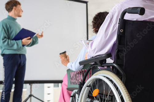 Young woman in wheelchair w...