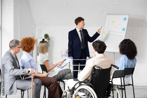 Male business speaker with ...