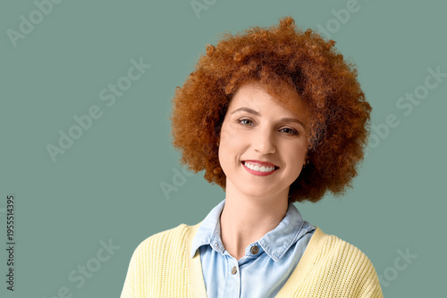Redhead young woman with cu...