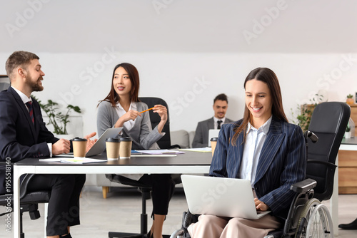 Businesswoman in wheelchair...