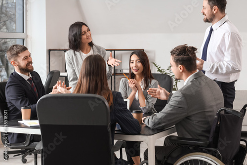 Business people with man in...