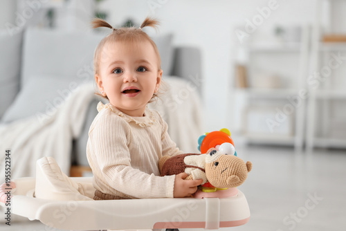 Cute little baby girl with ...