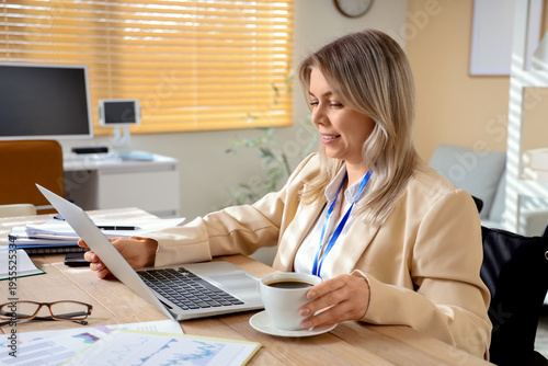 Young businesswoman working...