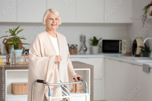 Senior woman with walker in...