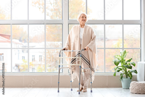 Senior woman with walker ne...