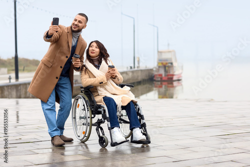 Young Asian woman in wheelc...