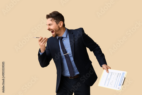 Angry businessman with clip...
