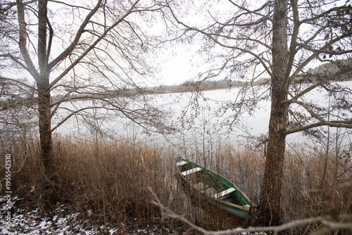 a small boat on the lake