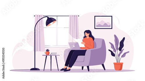 Woman sitting in a comfortable armchair while working on her laptop and reading documents in a cozy living room setting.