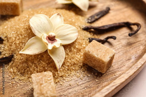 Wooden plate of vanilla sug...