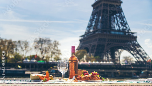 Photography Picnic and wine near the Eiffel Tower. Selective focus.