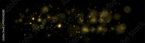 Bright golden sparks with trailing particles fall gracefully across a transparent canvas. The glowing dust forms a soft festive atmosphere. Ideal for holiday banners and seasonal decorations.