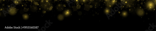 White and golden dust particles sparkle together in a glowing festive texture. The soft blur and light flares add depth and brilliance. Ideal for creative holiday design elements.