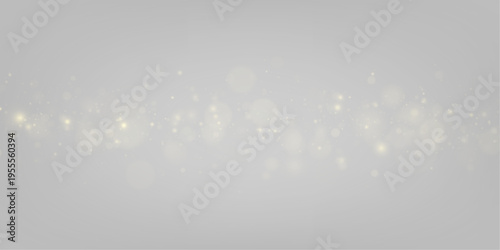 Golden glitter dust bursts into luminous bokeh circles, creating a festive and elegant visual texture. Tiny sparks scatter like shooting stars across the frame. Suitable for premium design projects.