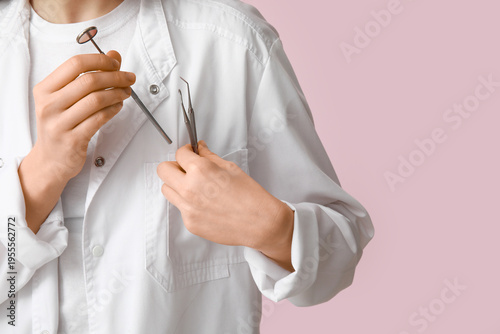 Female dentist with dental ...