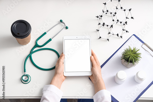 Female doctor with tablet c...