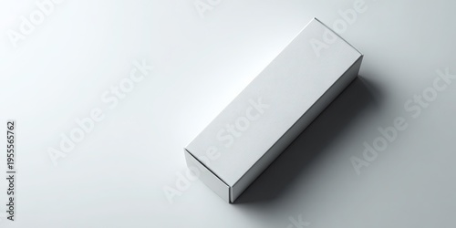 A beautifully wrapped gift box on a clean surface, perfect for holiday celebrations. A tube box mockup