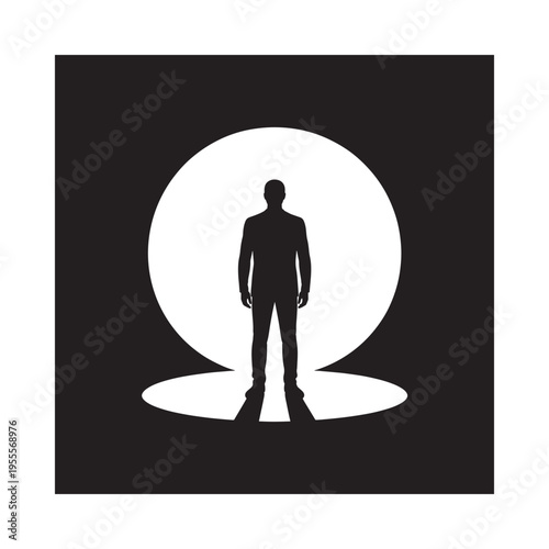Silhouetted figure of a man standing within a bright circular light source