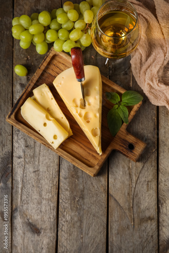 Board with tasty Swiss chee...
