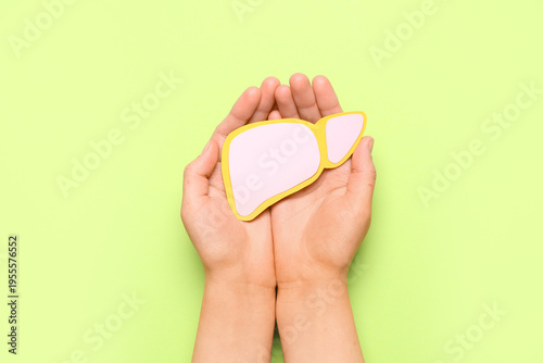 Female hands holding pink p...